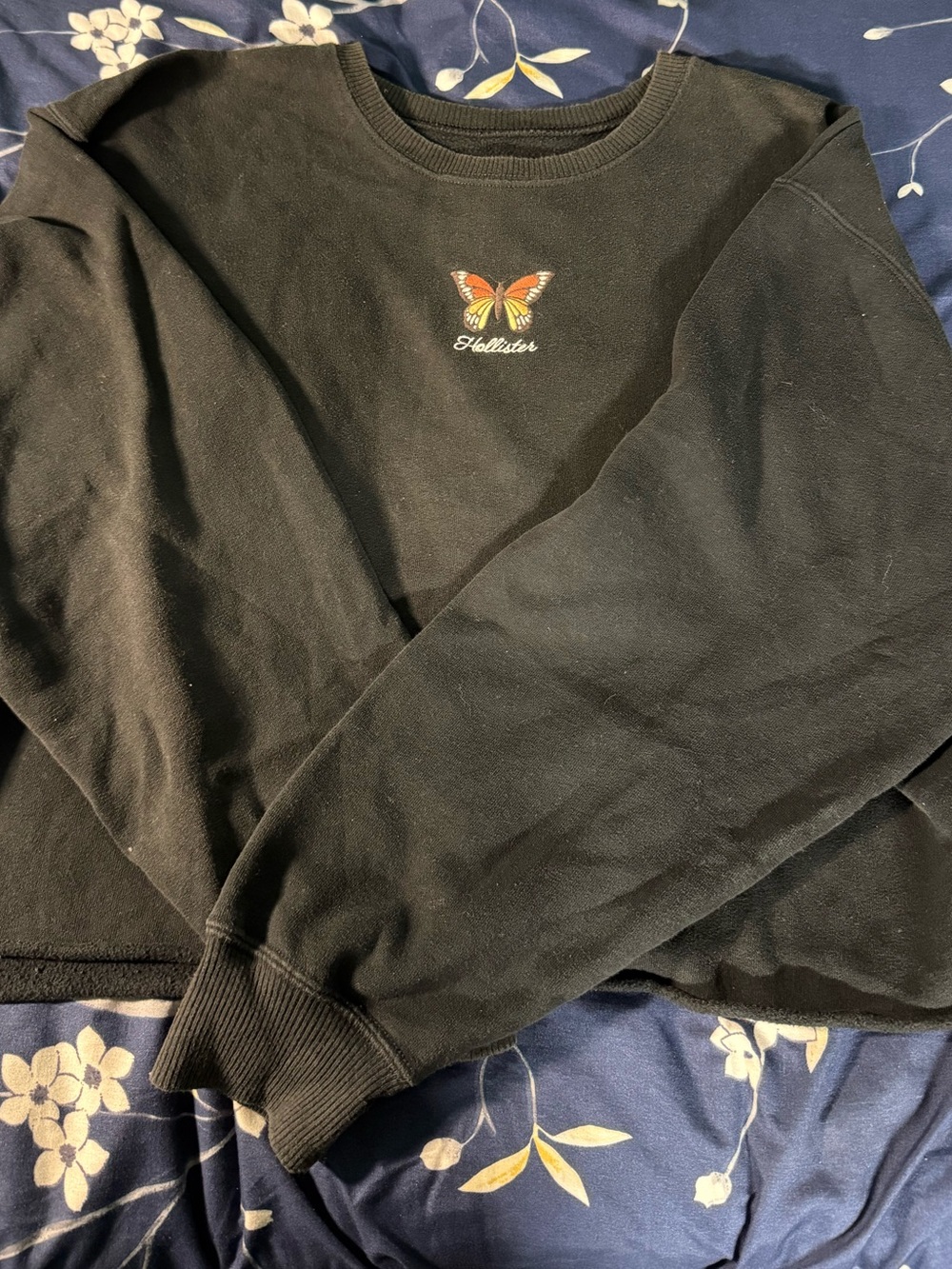 Hollister Co. black crewneck cropped sweatshirt with butterfly graphic